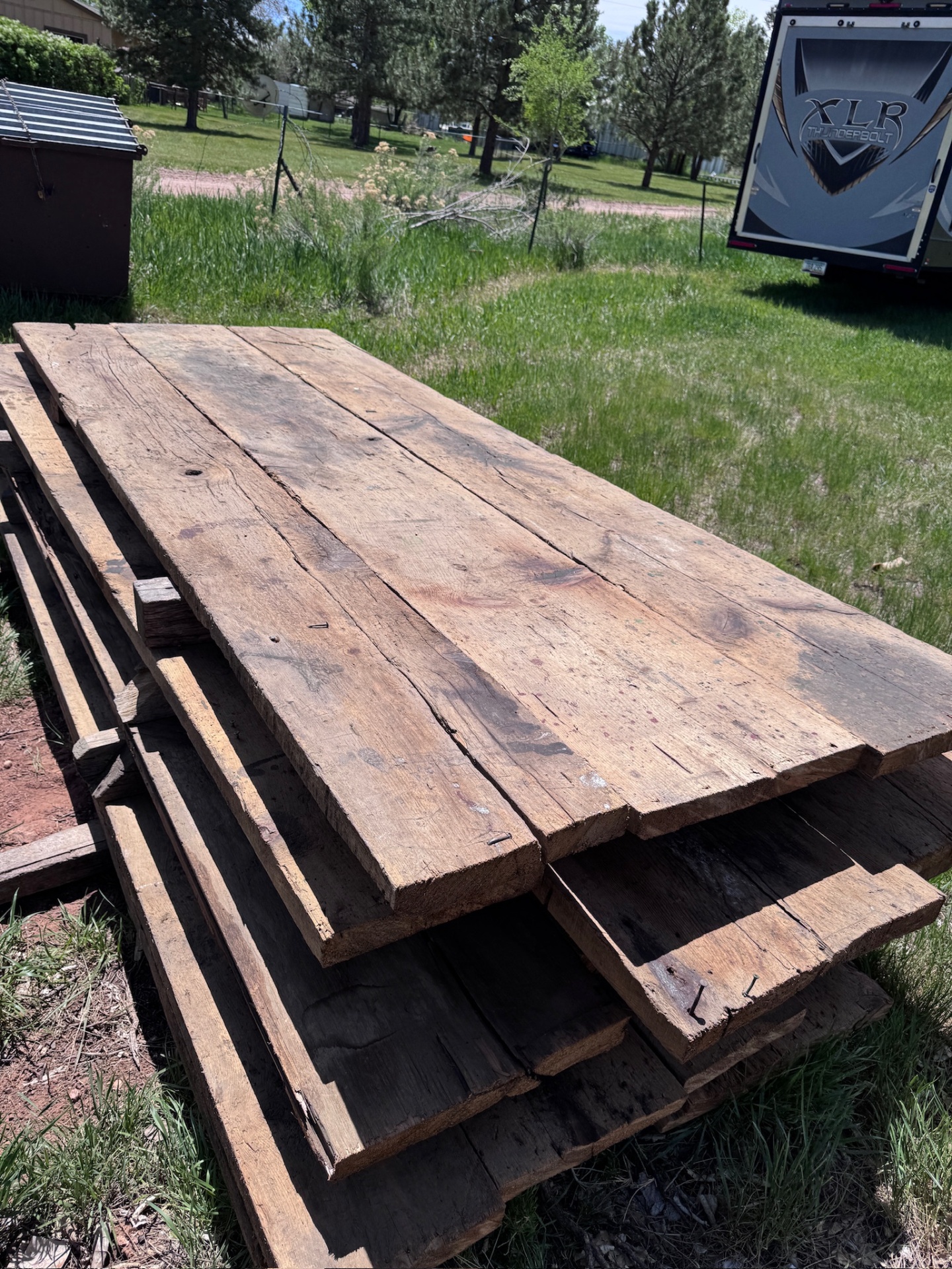 Stacked reclaimed boards ready for delivery