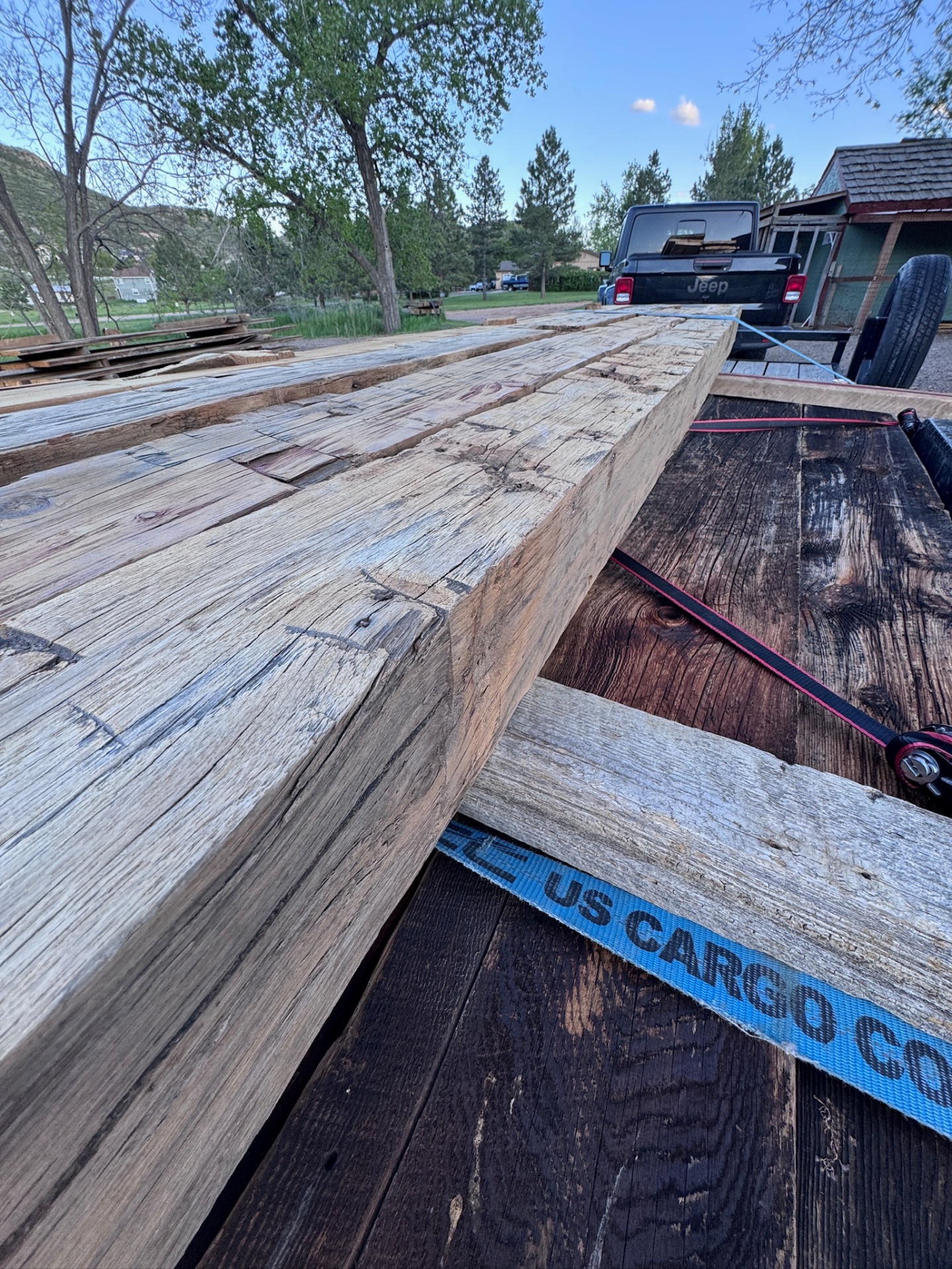Mixed beams strapped for transport